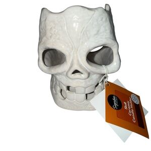 New with tag Signature Select Skull White Ceramic Candle Holder.